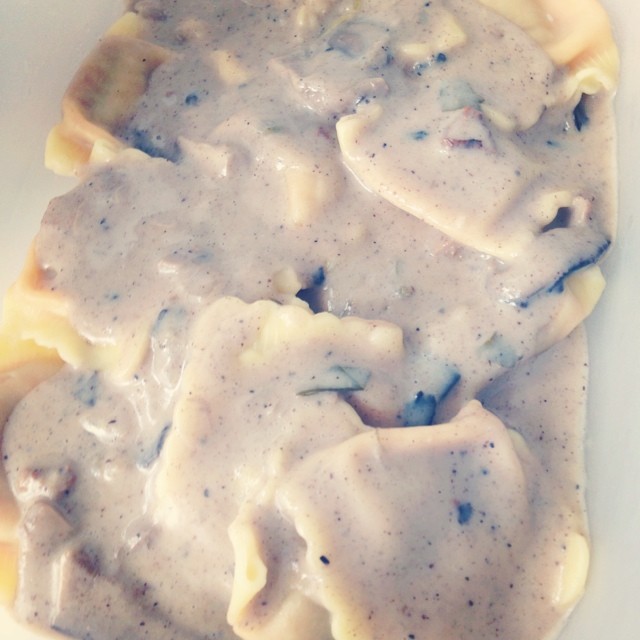 Just made lunch for tomorrow.  Beef in red wine ravioli with wild mushroom sauce. - from Instagram