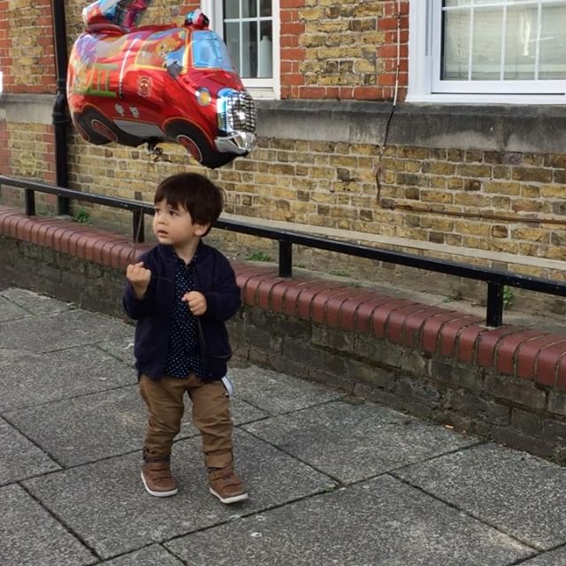 The boys happy with his balloon 